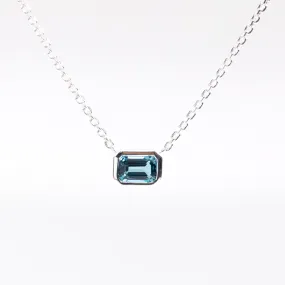 Blue Topaz Bezel Set Solitaire Silver Necklace